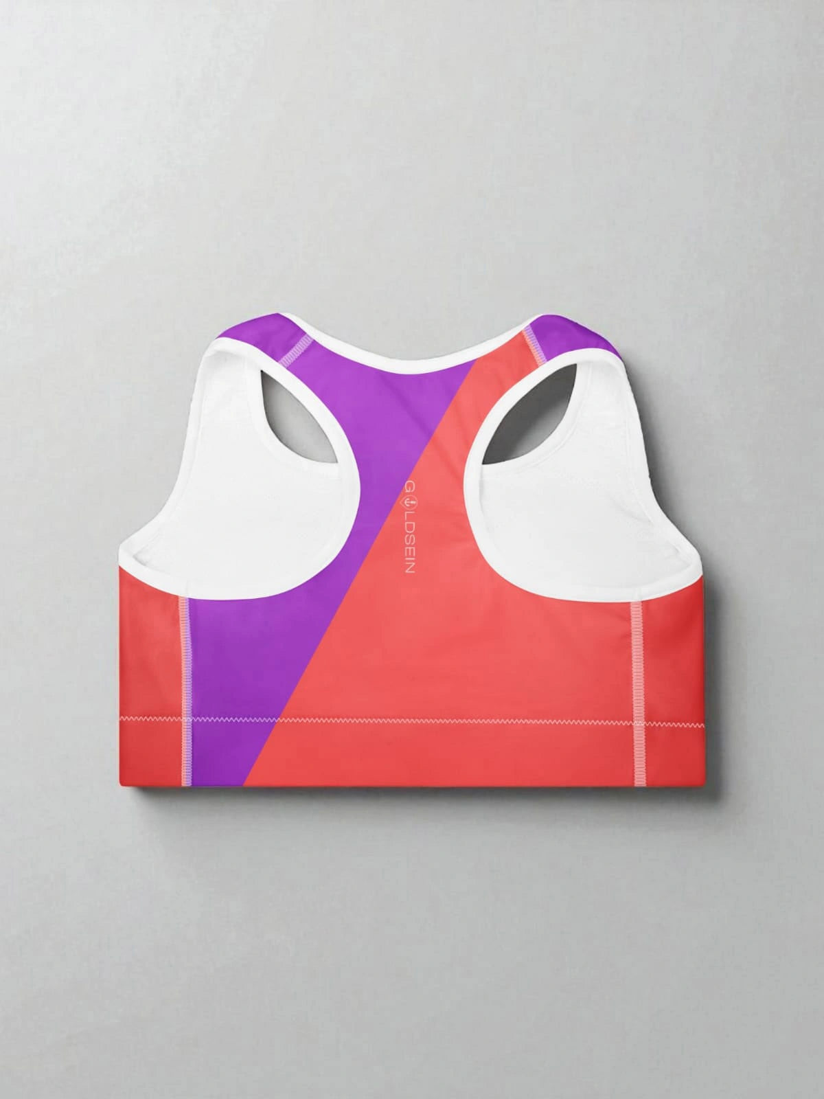 „Gepolsterter Sport-BH in Koralle-Lila mit ‚Namaste‘-Design – entwickelt für maximale Performance und ein starkes Gefühl – Goldsein Padded Sports Bra.“detail1