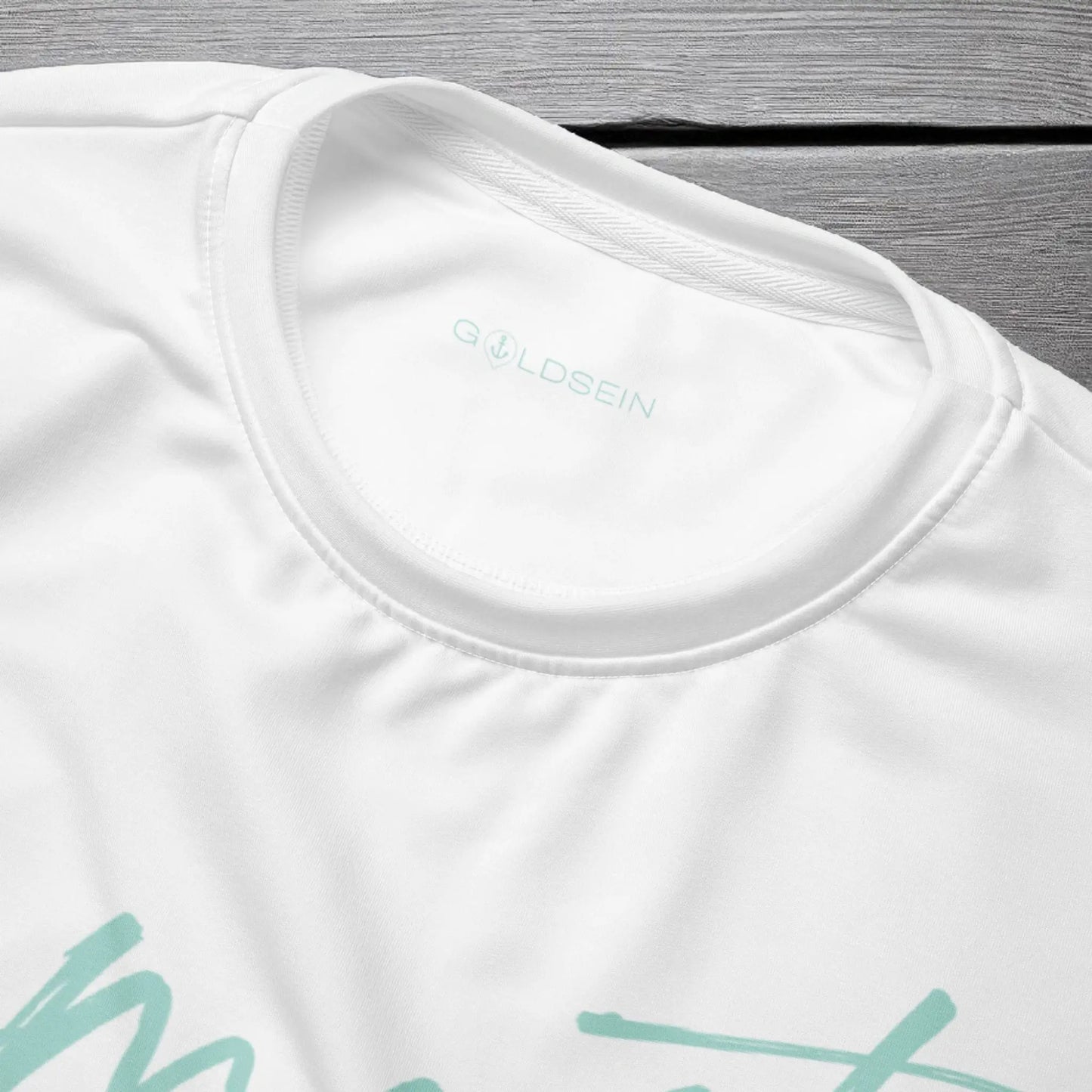 „Goldsein Woman Sweatshirt ‚Namaste‘ in Weiß-Türkis – entspannt, soft und bequem.“detail