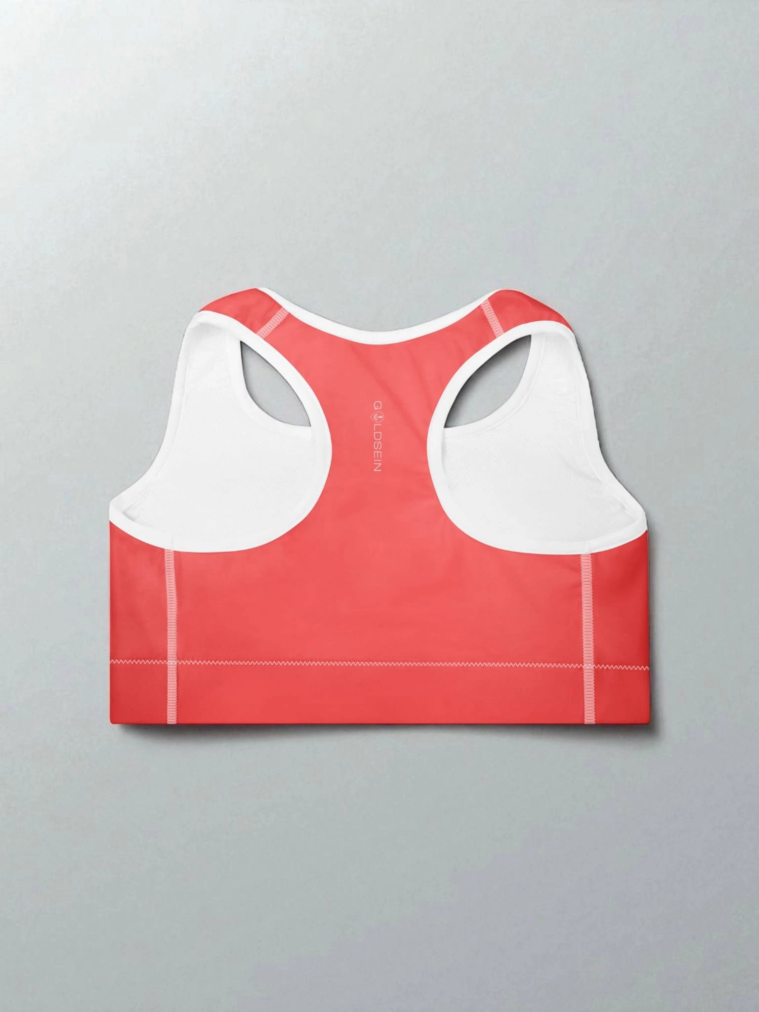 „Stylischer, gepolsterter Sport-BH in Koralle mit ‚Namaste‘-Design – entwickelt für maximale Performance beim Training – Goldsein Padded Sports Bra.“detail1